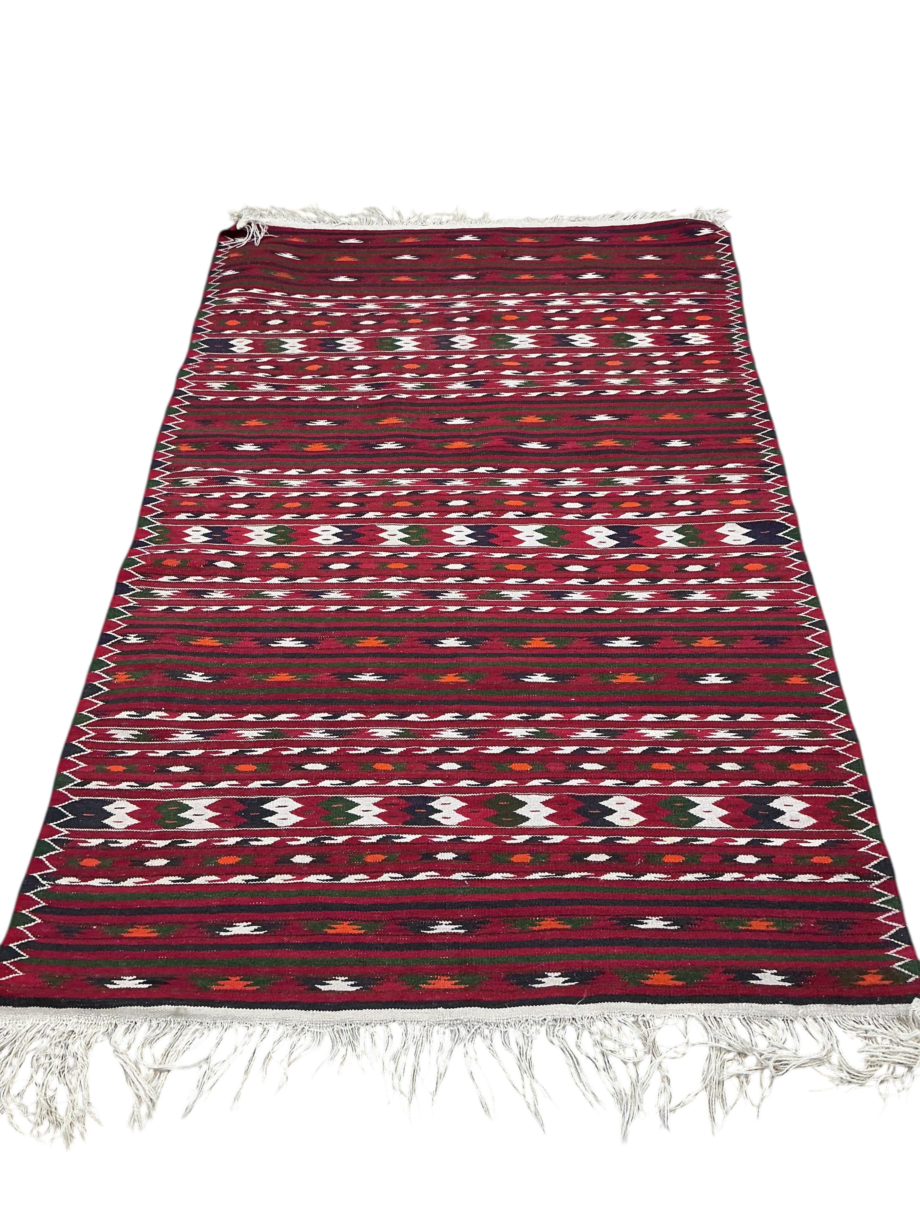 A Kilim flatweave red ground rug, 190 x 120cm